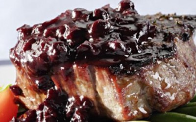 Grilled Pork Chops with Blueberry Barbecue Sauce